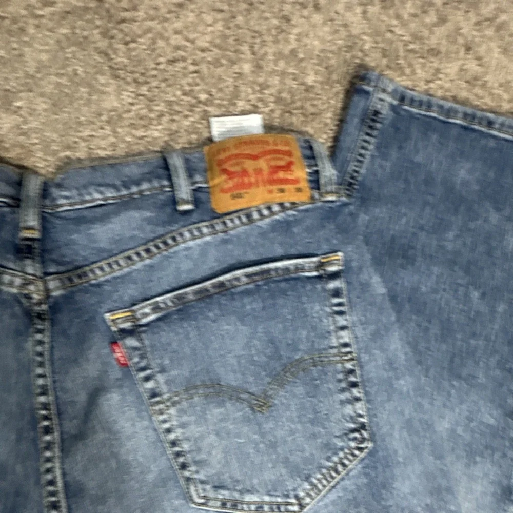 Levi's Men's Blue Denim Jeans Medium Wash Tapered‎ 5-Pocket Logo Cotton